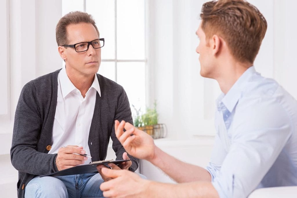 man asking therapist what is medical detox