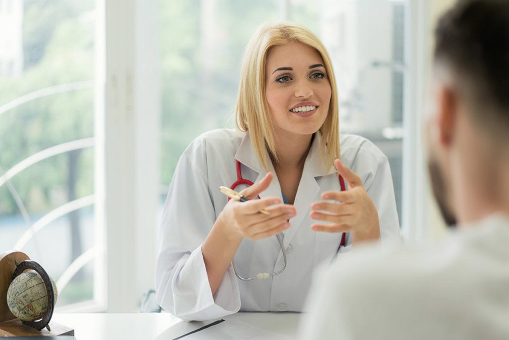 a doctor explains substance abuse preventions to her patient