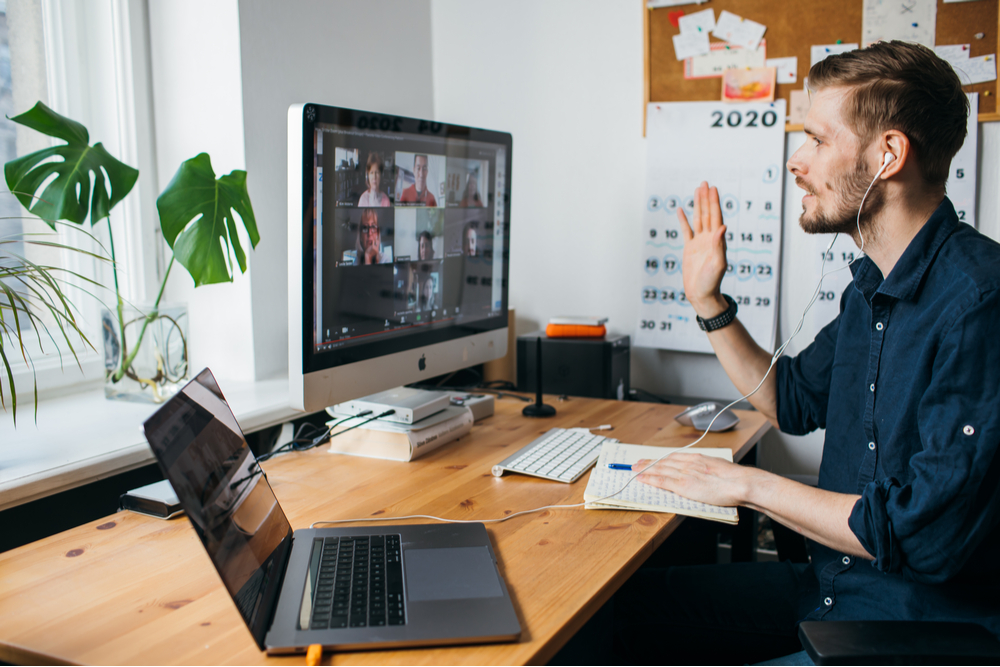 Man at computer for his online support for recovery