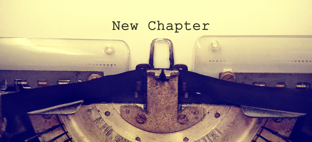 typewriter with new chapter written