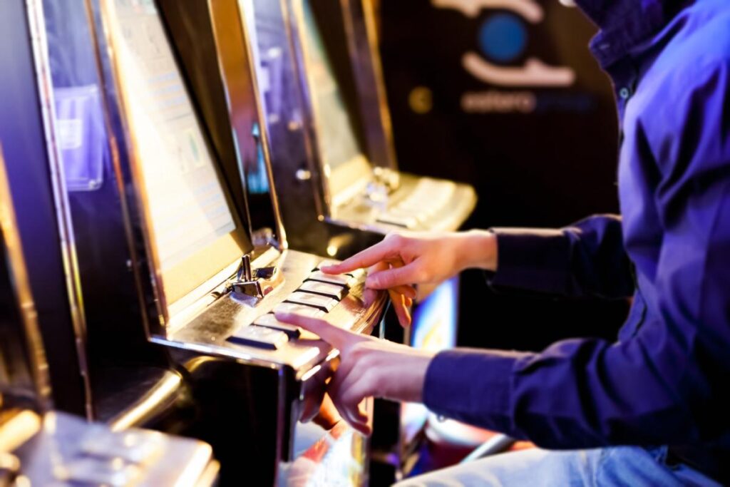 person displaying signs of gambling addiction