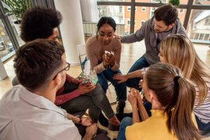 Person receiving support from a therapy group in a cocaine addiction treatment center