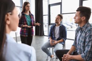 People talking at a drug addiction treatment center