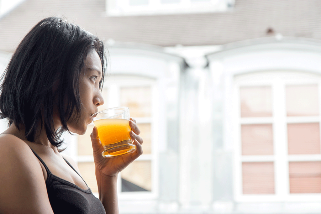 Woman who knows about withdrawal and orange juice