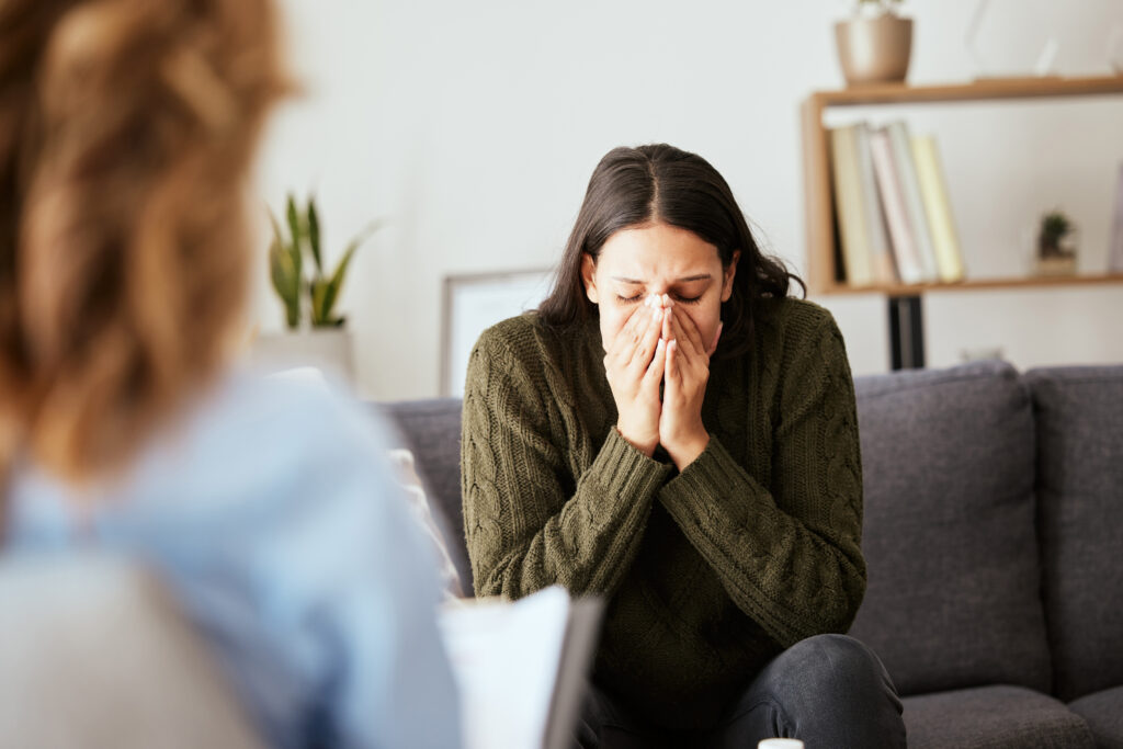 A woman upset about her opioid relapse