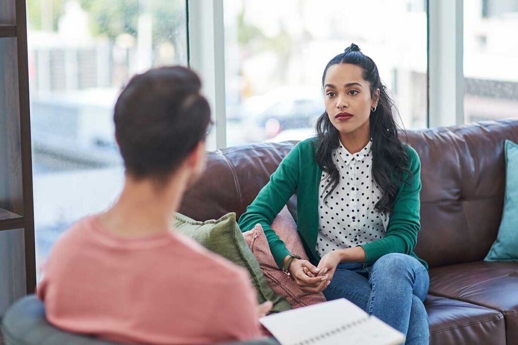A woman asking about DBT techniques