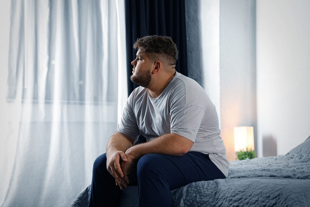 A man thinking about dissociation and trauma